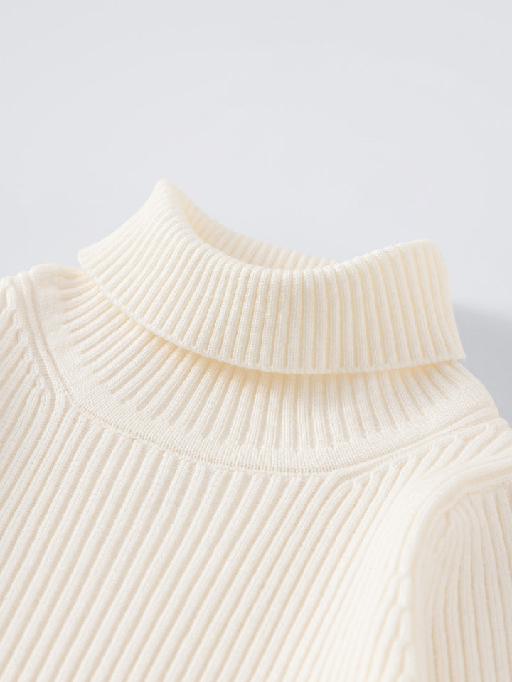 RIBBED KNIT TOP WITH FEATHER CUFFS