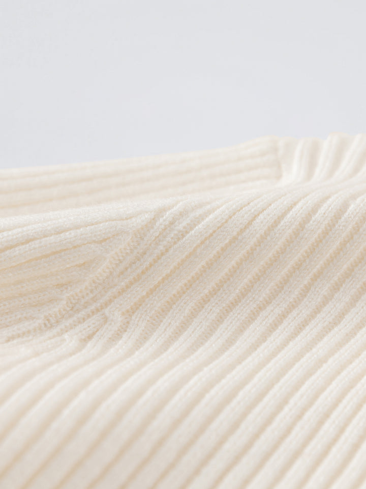 RIBBED KNIT TOP WITH FEATHER CUFFS