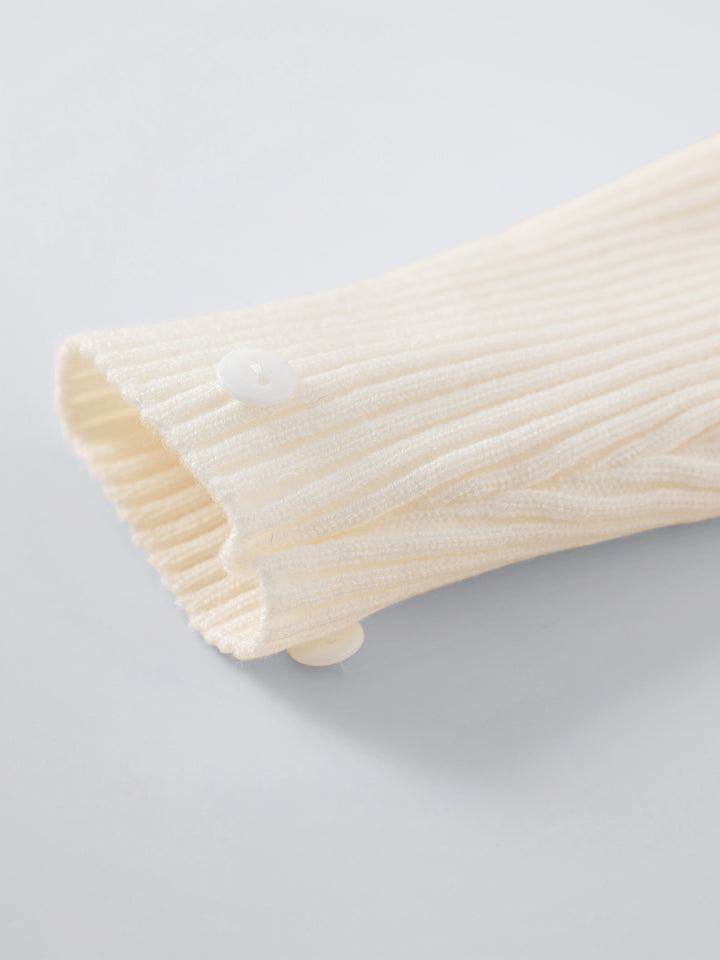 RIBBED KNIT TOP WITH FEATHER CUFFS