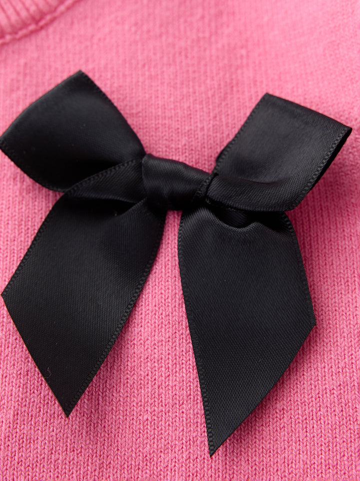 كنزة محبوكة مزينة ببيونات