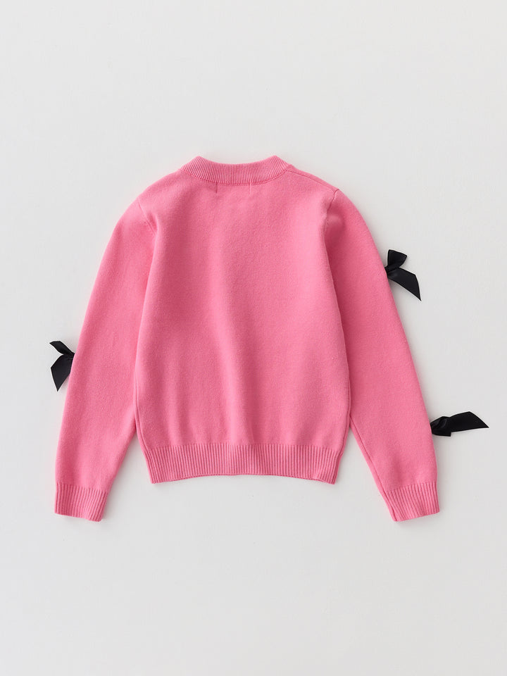 كنزة محبوكة مزينة ببيونات