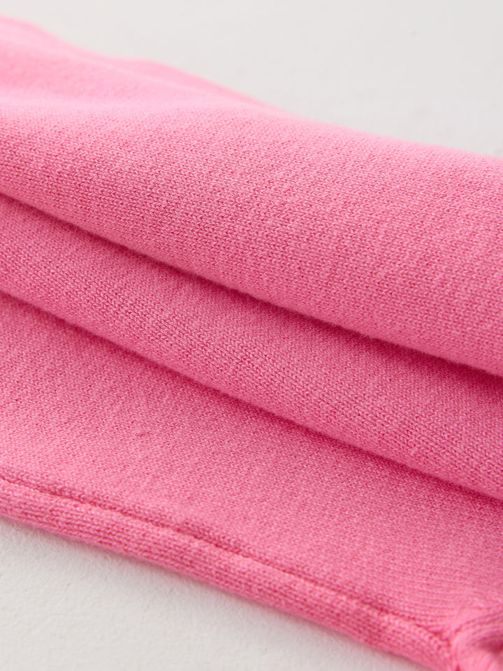 كنزة محبوكة مزينة ببيونات