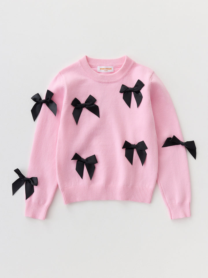 كنزة محبوكة مزينة ببيونات