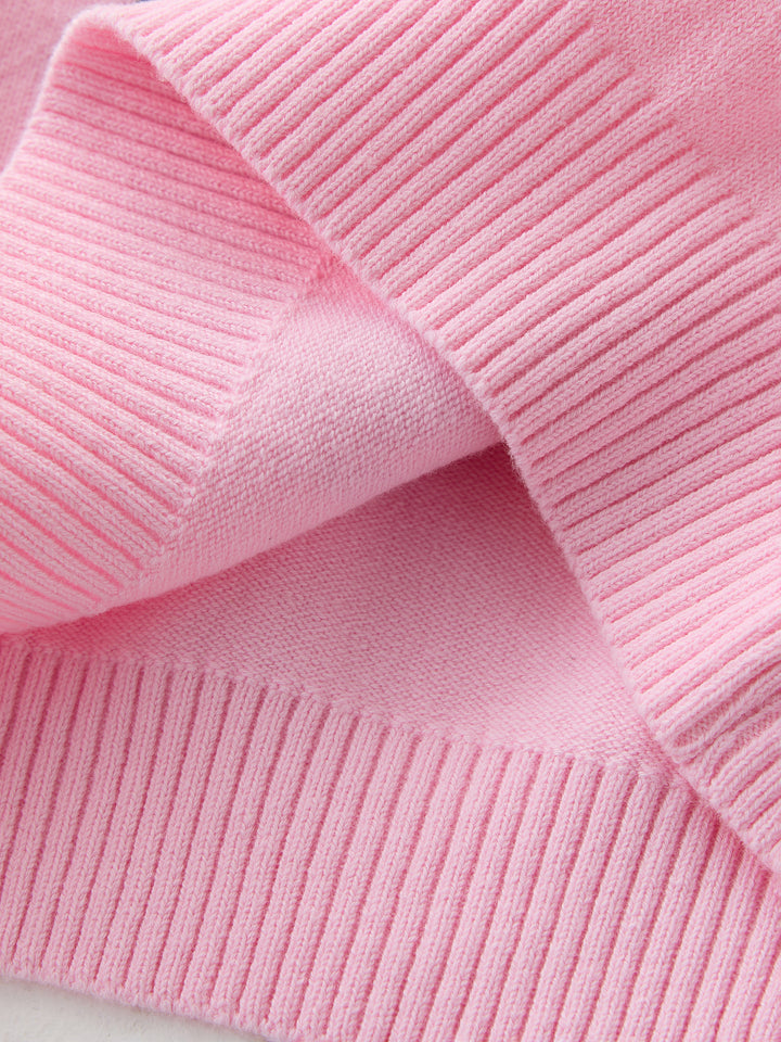 كنزة محبوكة مزينة ببيونات