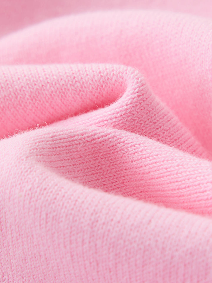 كنزة محبوكة مزينة ببيونات